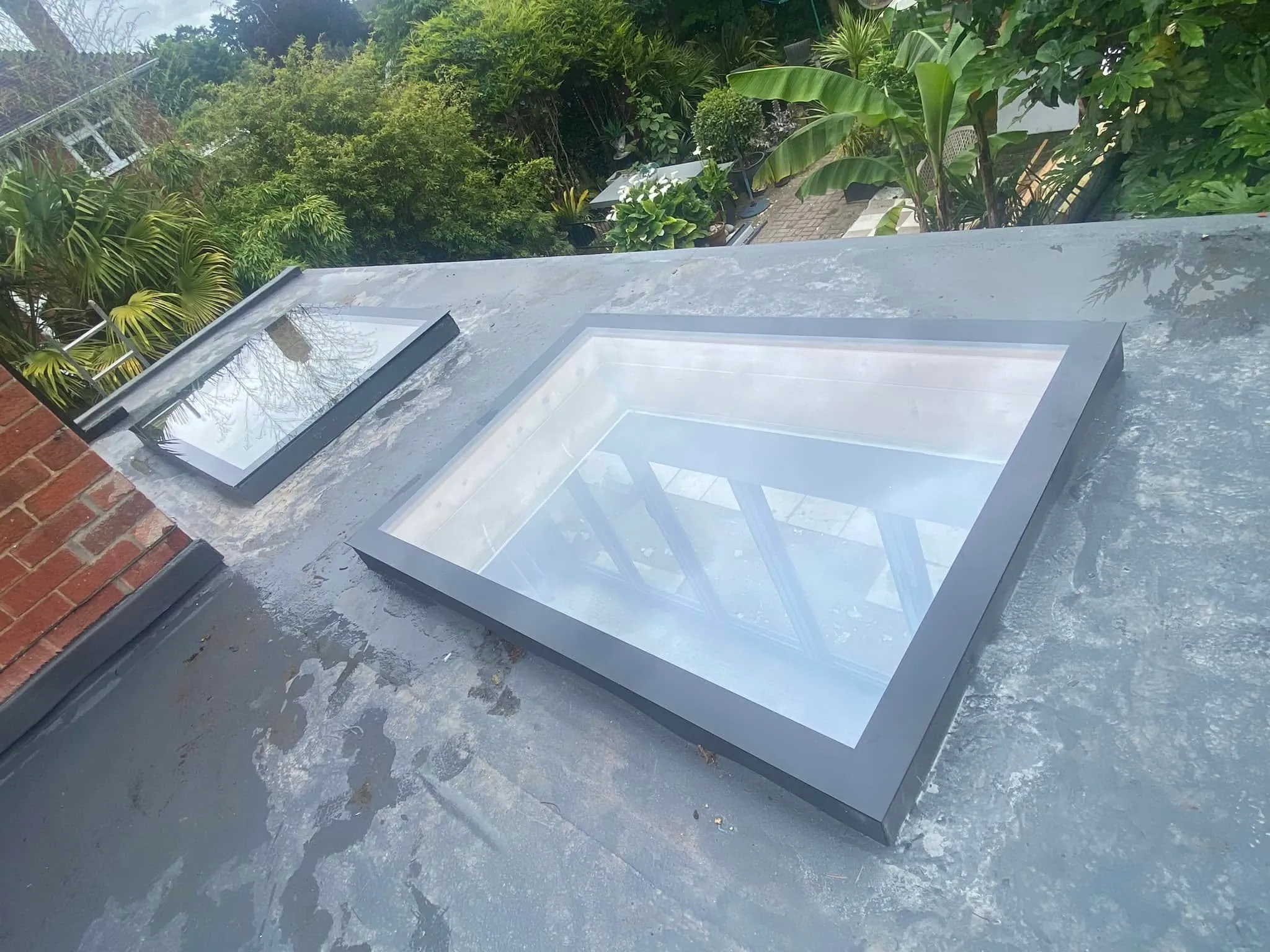 Flat roof skylights fitted on a single-storey extension
